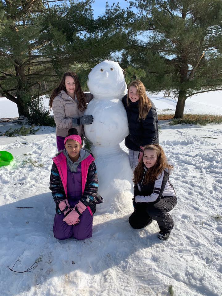 Playing in the snow at Winterfest Youth Retreat